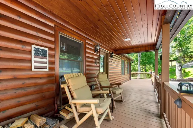 a view of balcony with wooden floor