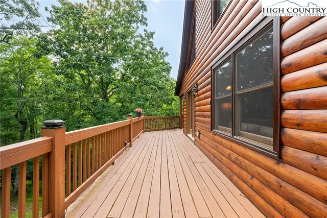 a view of balcony with wooden floor