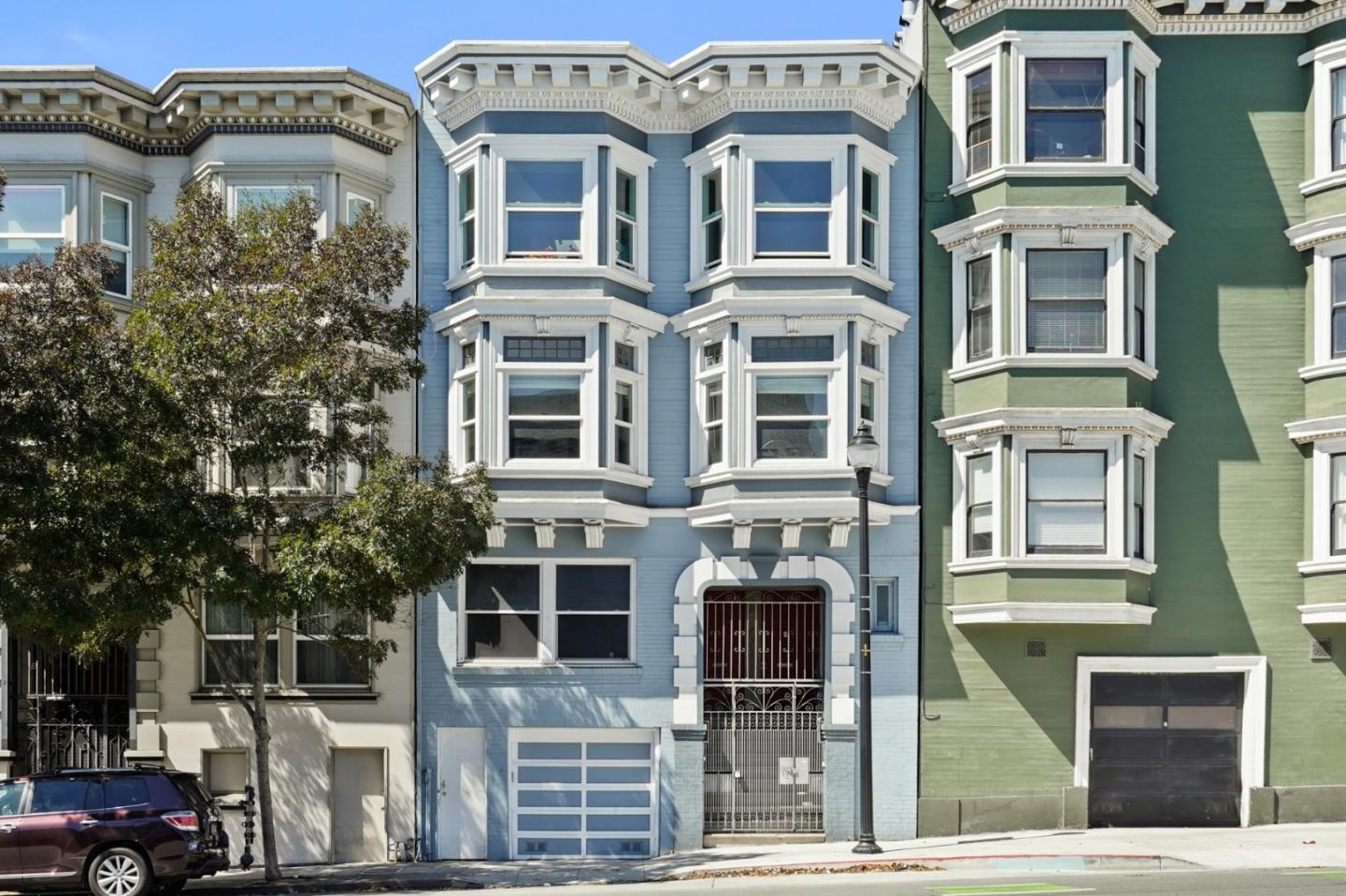 809 Masonic Avenue San Francisco, CA 94117 - Photo 2 of 30 a front view of a multi story building