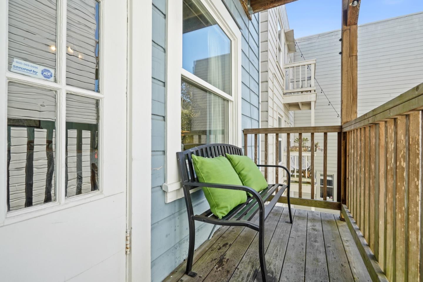 809 Masonic Avenue San Francisco, CA 94117 - Photo 25 of 30 a view of a balcony with chairs and a swing
