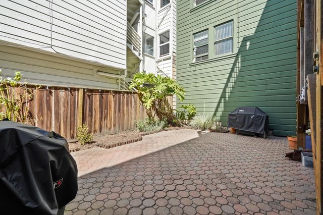 a backyard of a house with seating space