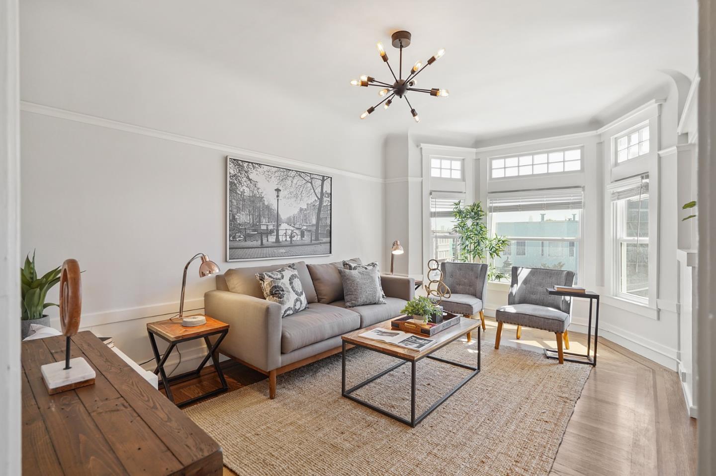809 Masonic Avenue San Francisco, CA 94117 - Photo 6 of 30 a living room with furniture and a large window