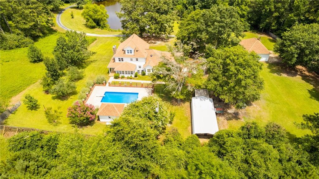 91 Stockmar Road Villa Rica, GA 30180 - Photo 1 of 1 a building view with swimming pool