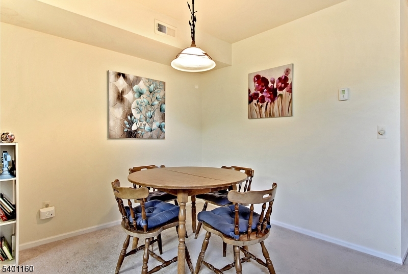 62 Bentley Court Bedminster, NJ 07921 - Photo 7 of 15 a dining room with furniture and window