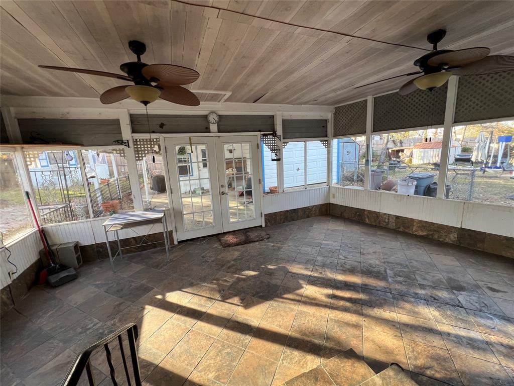 909 Rindie Street Irving, TX 75060 - Photo 12 of 18 a view of an empty room with a window