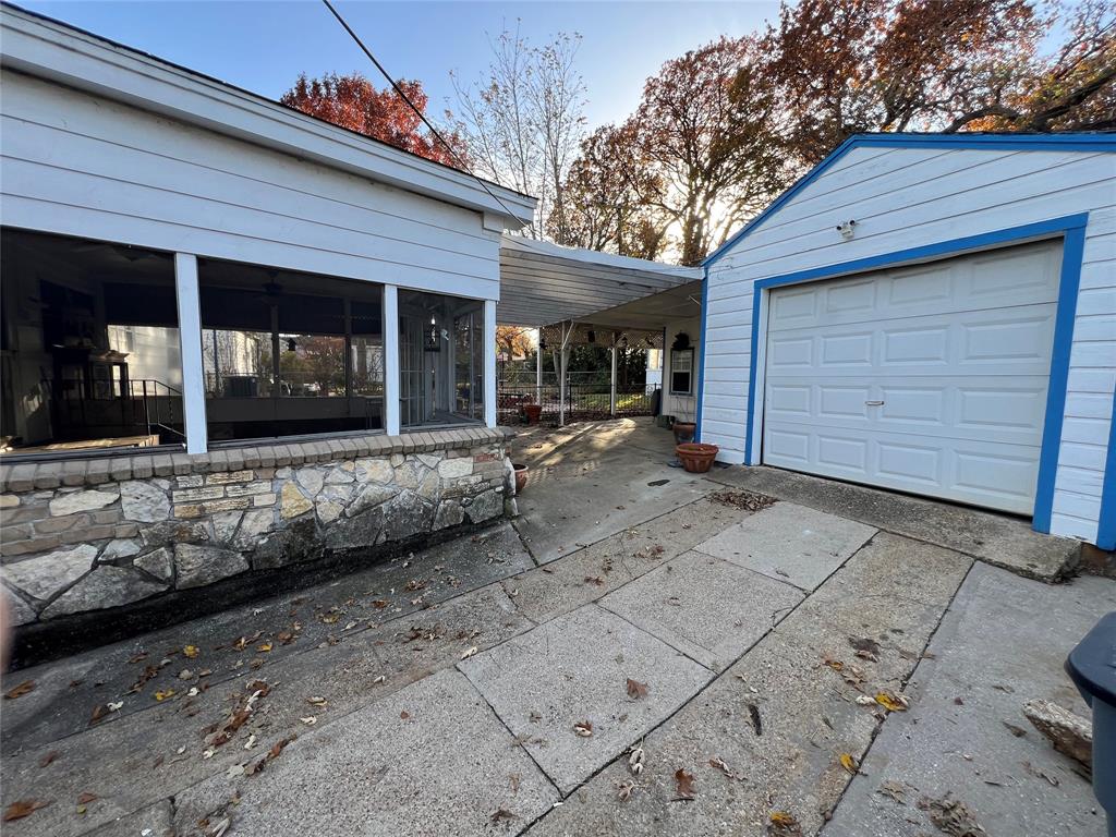909 Rindie Street Irving, TX 75060 - Photo 17 of 18 a front view of a house with a yard