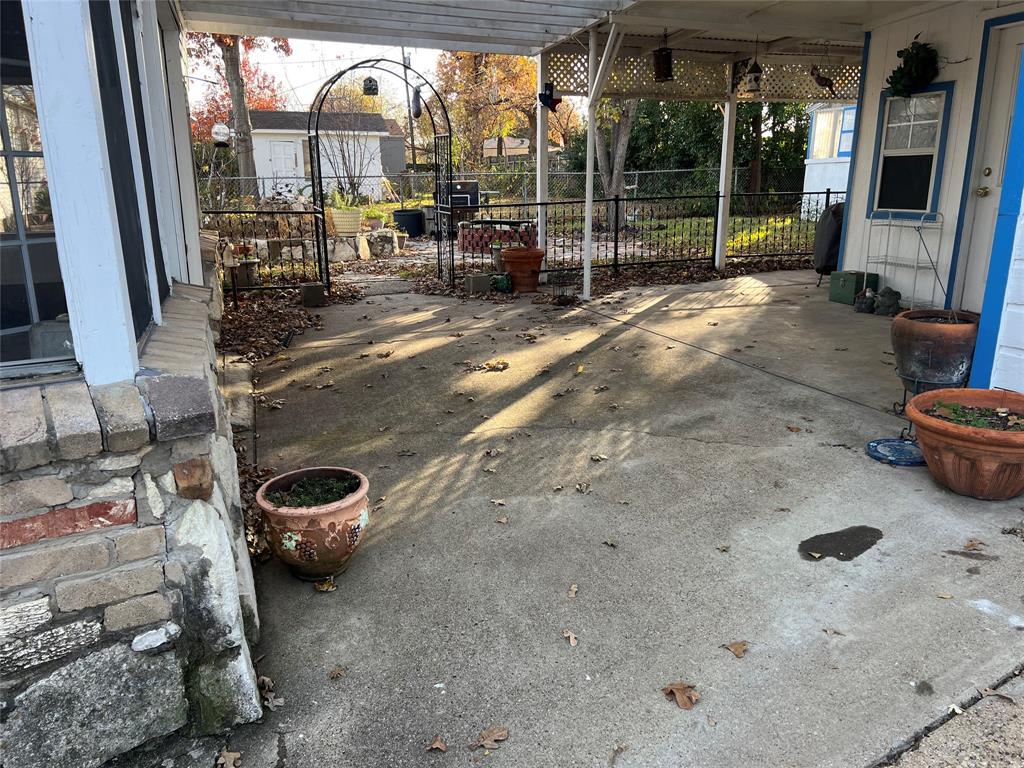 909 Rindie Street Irving, TX 75060 - Photo 18 of 18 a view of outdoor space and patio