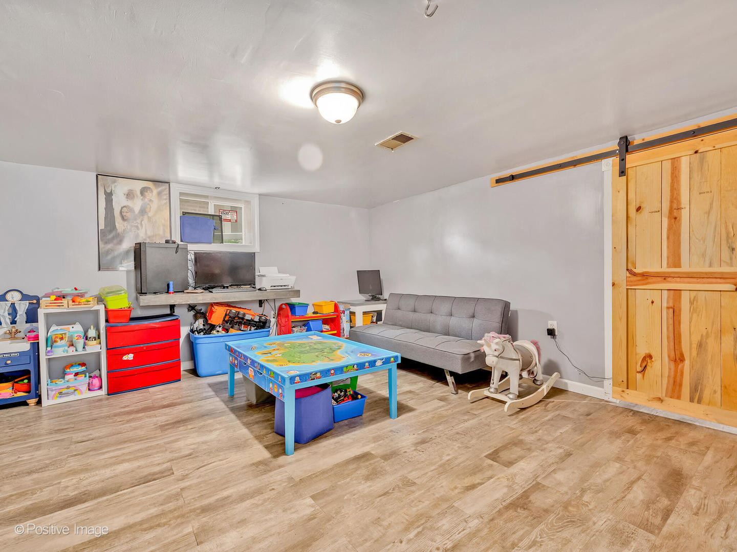 4154 Elm Avenue Brookfield, IL 60513 - Photo 14 of 20 a room with toys and a wooden floor