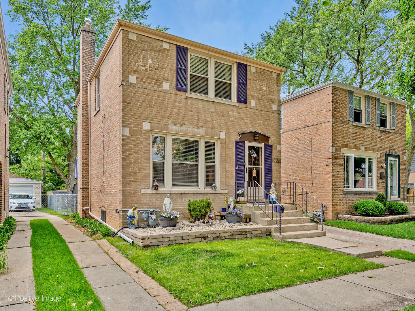 4154 Elm Avenue Brookfield, IL 60513 - Photo 2 of 20 a front view of a house with garden and porch