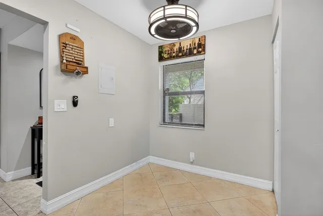 a view of a storage and utility room with a window