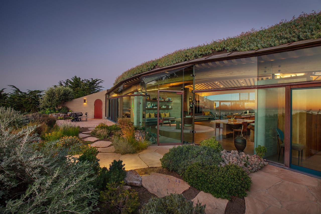 Clear Ridge Road Big Sur, CA 93920 - Photo 9 of 25 a backyard of a house with yard table and chairs