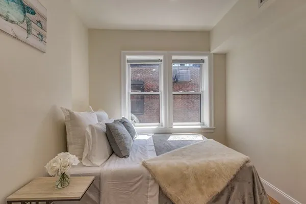 a living room with furniture and window