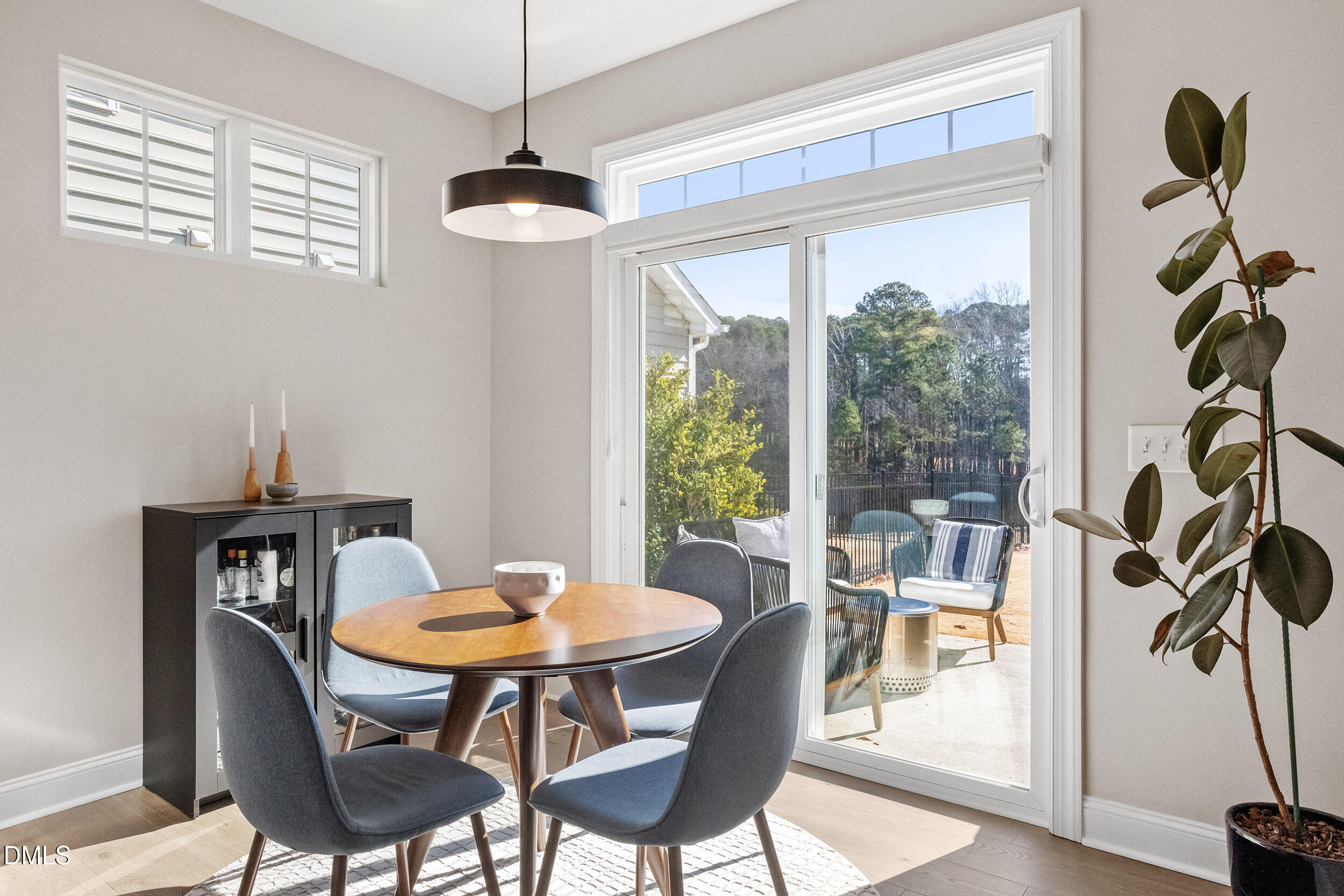 1602 Farm Pond Trail Durham, NC 27703 - Photo 13 of 43 a view of a dining room with furniture window and outside view