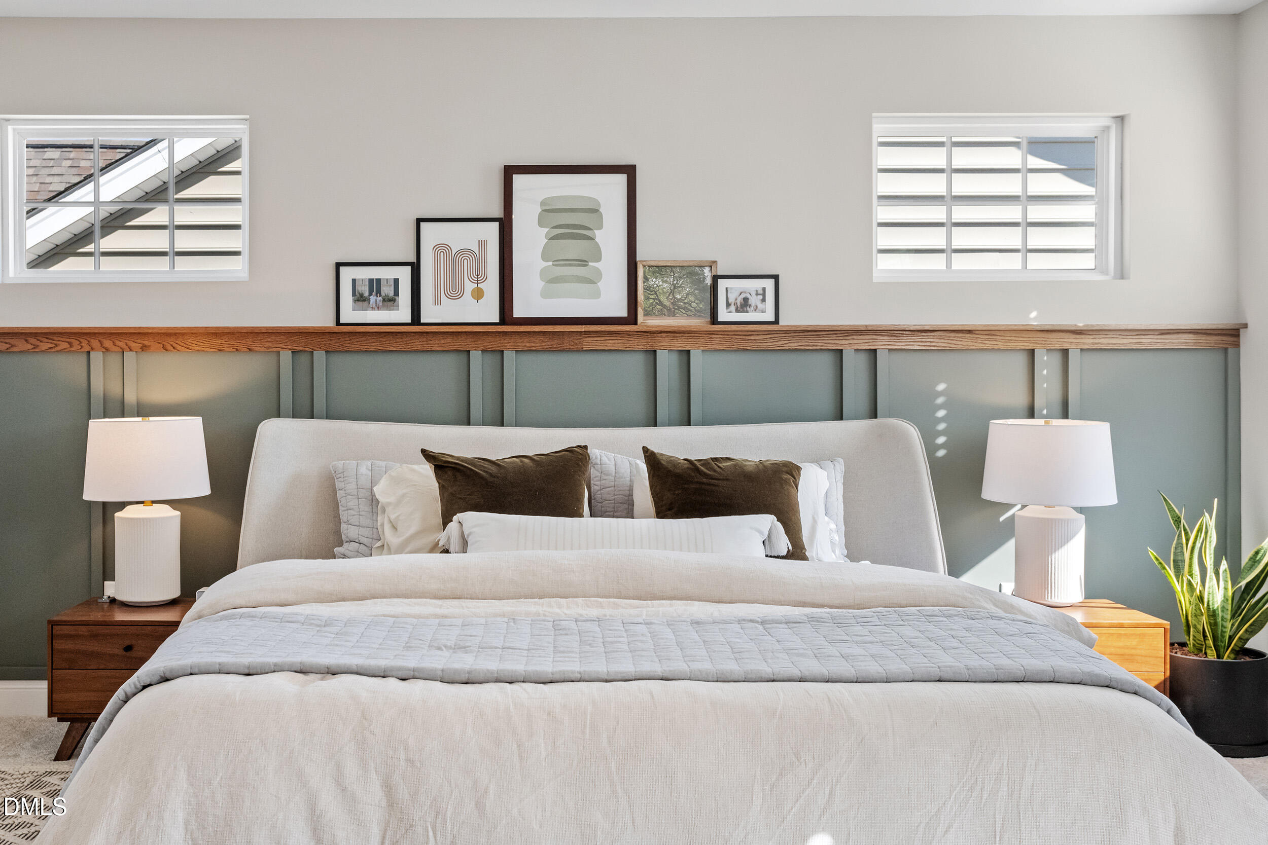 1602 Farm Pond Trail Durham, NC 27703 - Photo 21 of 43 a large bed sitting in a bedroom next to a window