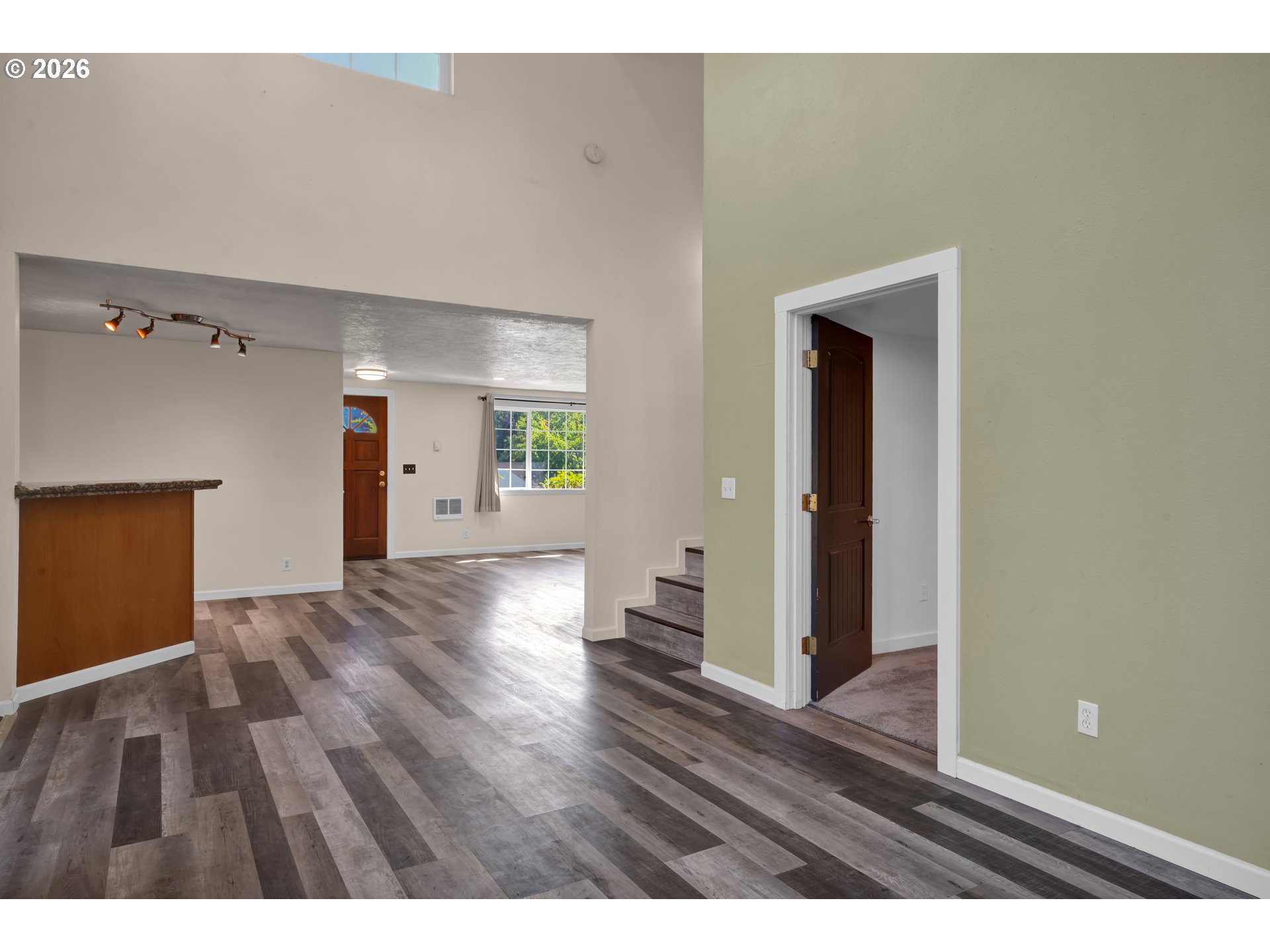 947 South R Street Cottage Grove, OR 97424 - Photo 18 of 48 a view of an empty room and wooden floor