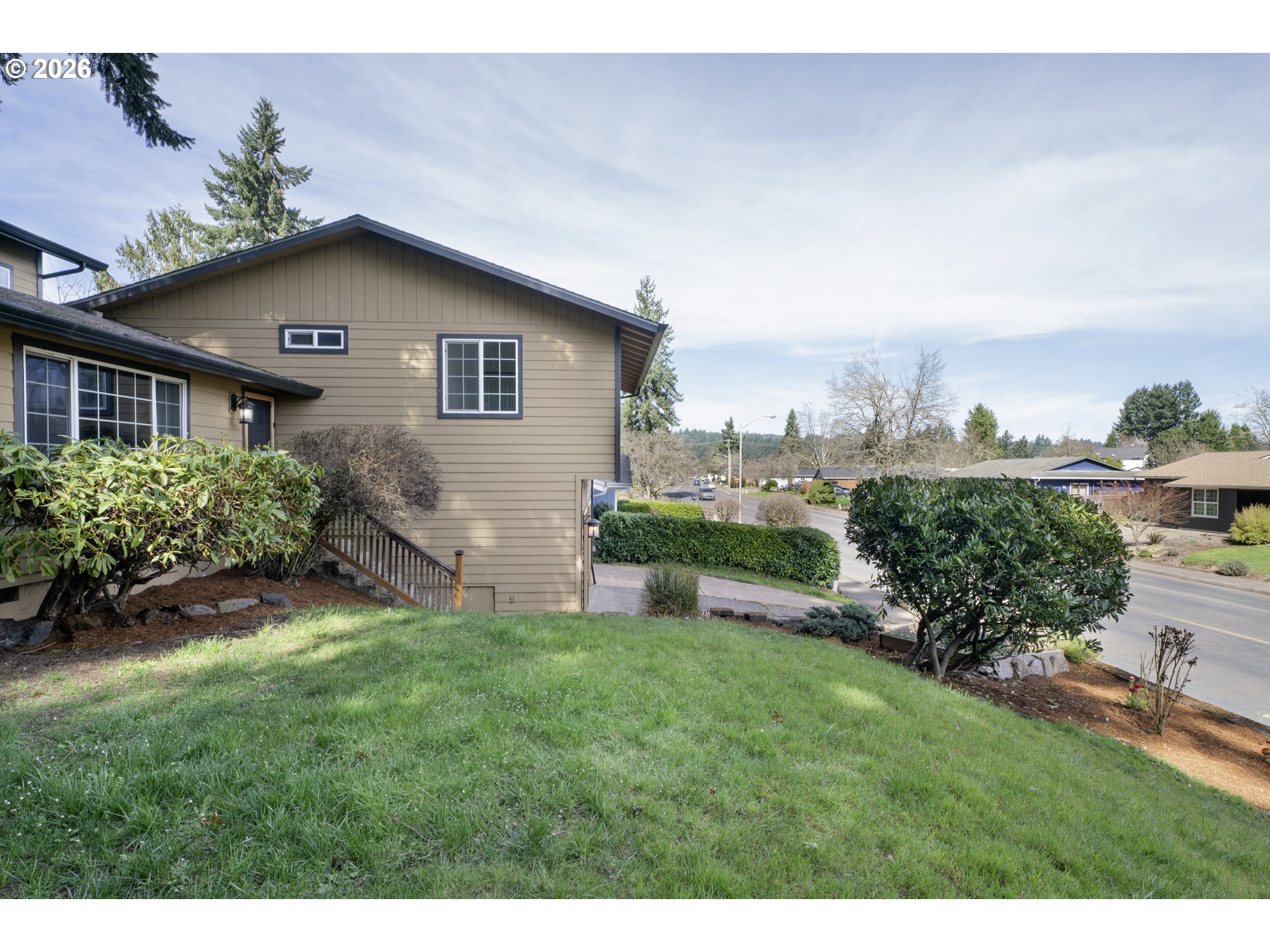 947 South R Street Cottage Grove, OR 97424 - Photo 7 of 48 a house view with a garden space