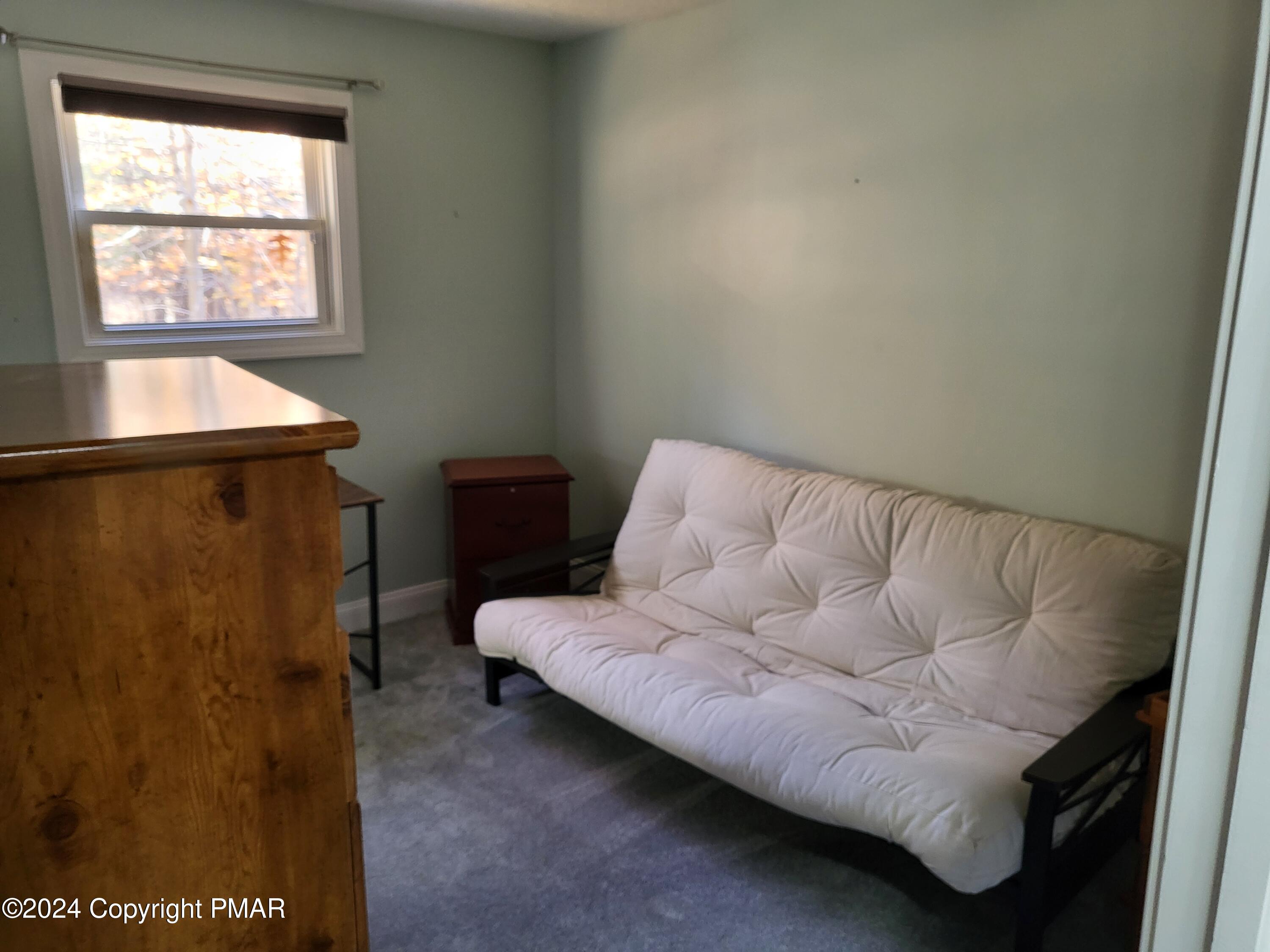 191 Sportsmen Drive Cresco, PA 18326 - Photo 19 of 29 a living room with furniture and a window