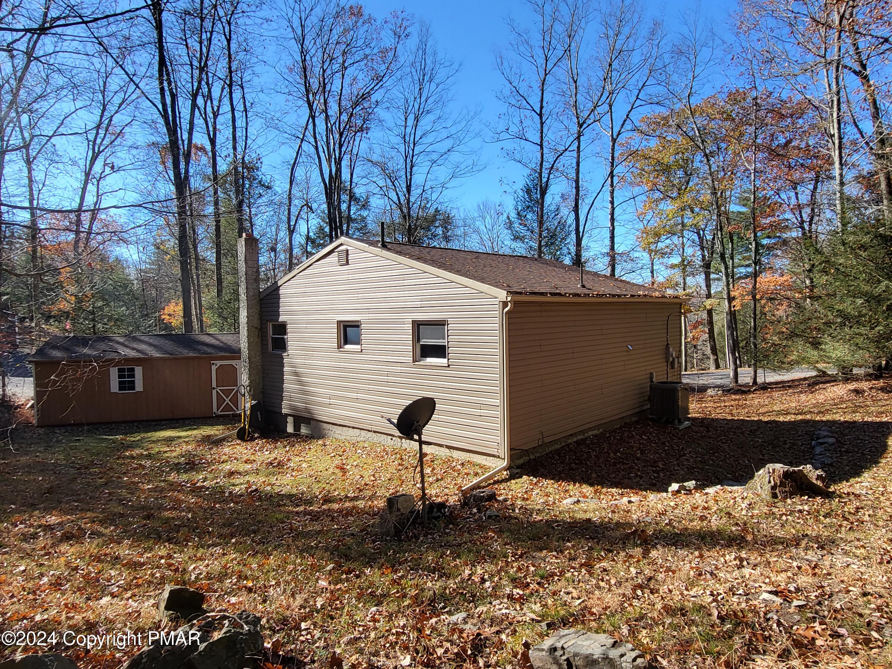 191 Sportsmen Drive Cresco, PA 18326 - Photo 26 of 29 a view of a house with a yard covered in snow