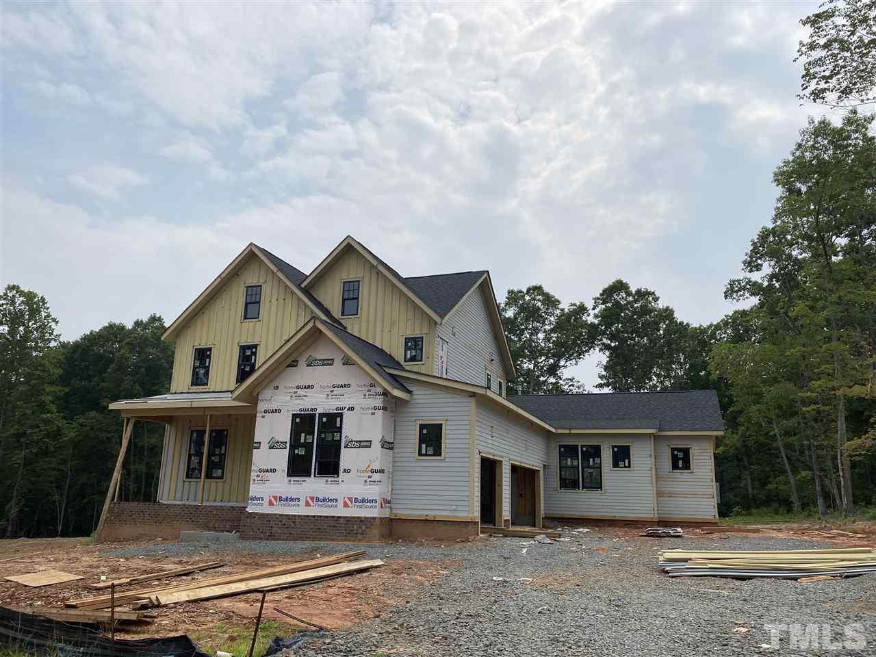2221 Duskywing Drive Raleigh, NC 27613 - Photo 3 of 3 a house view with a garden