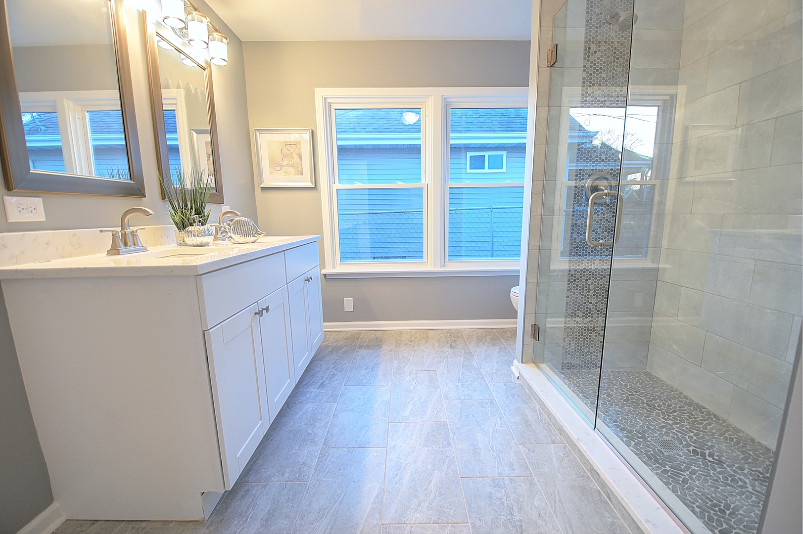 1407 Birch Road Homewood, IL 60430 - Photo 8 of 13 a bathroom with a granite countertop sink a mirror and a bathtub