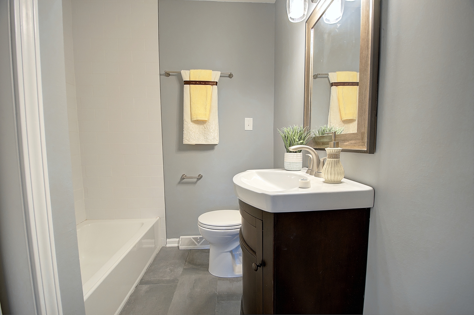 1407 Birch Road Homewood, IL 60430 - Photo 9 of 13 a bathroom with a sink toilet and shower