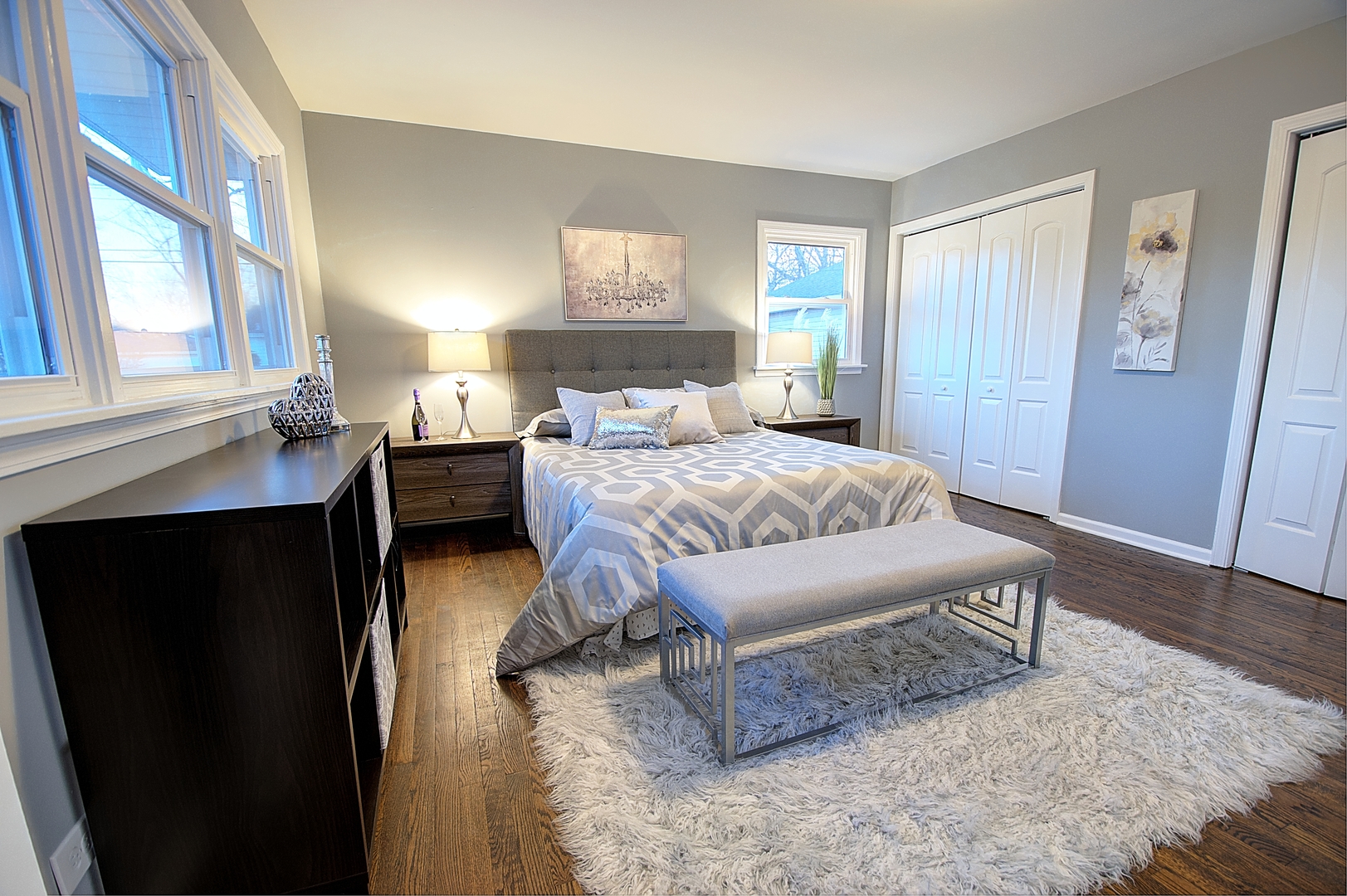 1407 Birch Road Homewood, IL 60430 - Photo 10 of 13 a bedroom with a bed and wooden floor