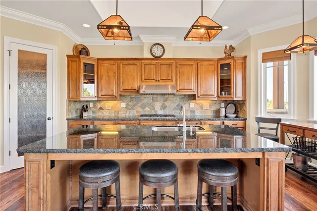 a bathroom with a sink toilet and mirror