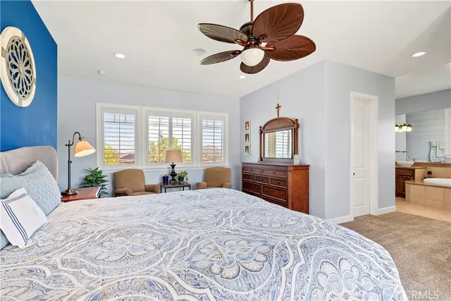 a bedroom with a bed and a closet