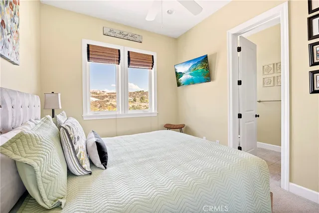 a view of a swimming pool with a table and chairs