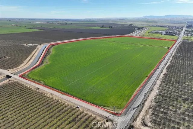 a view of a pool with a yard