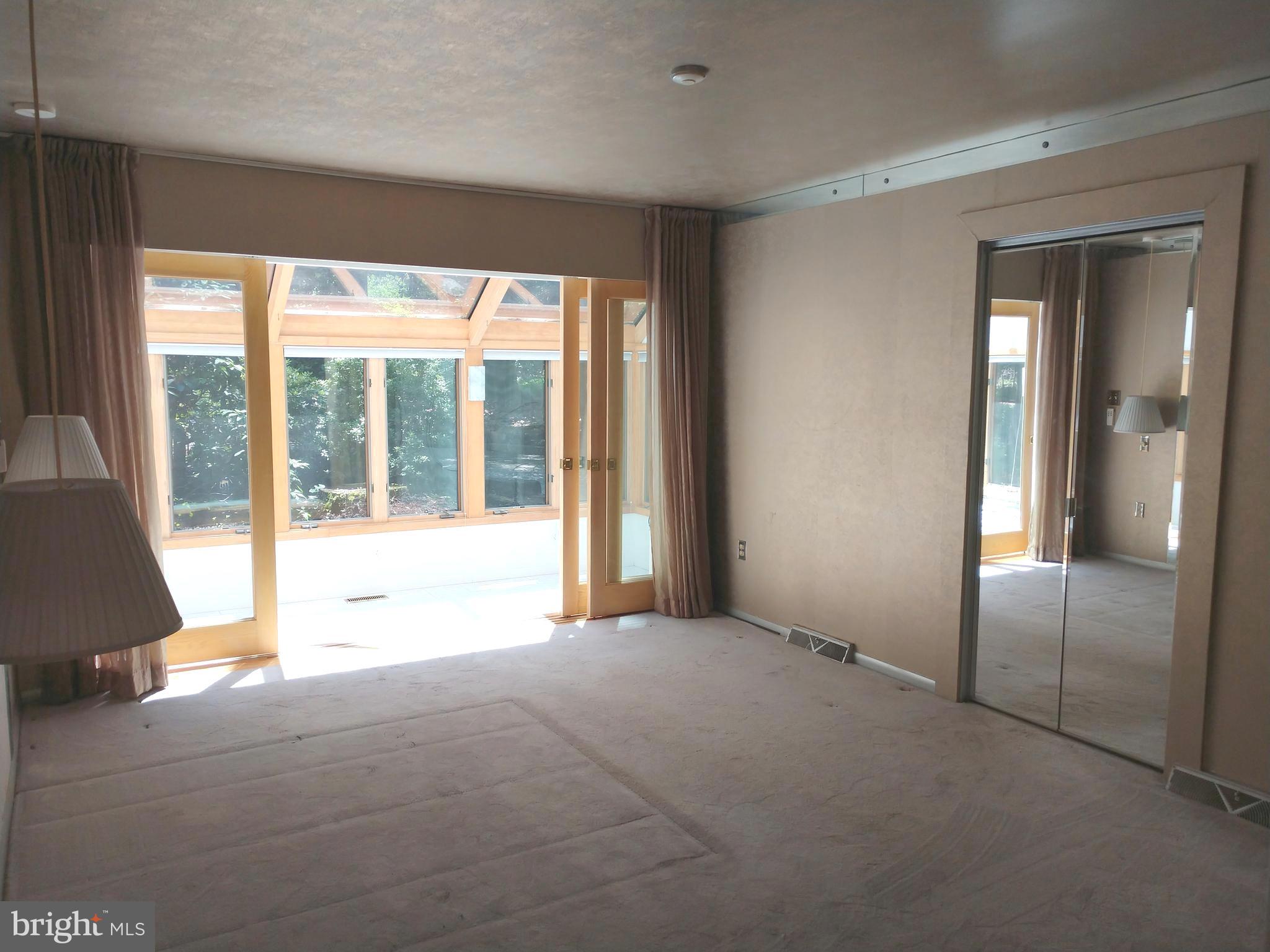 323 Mt Penn Road Reading, PA 19607 - Photo 14 of 75 Master suite into 4 season sunroom. Pocket doors.