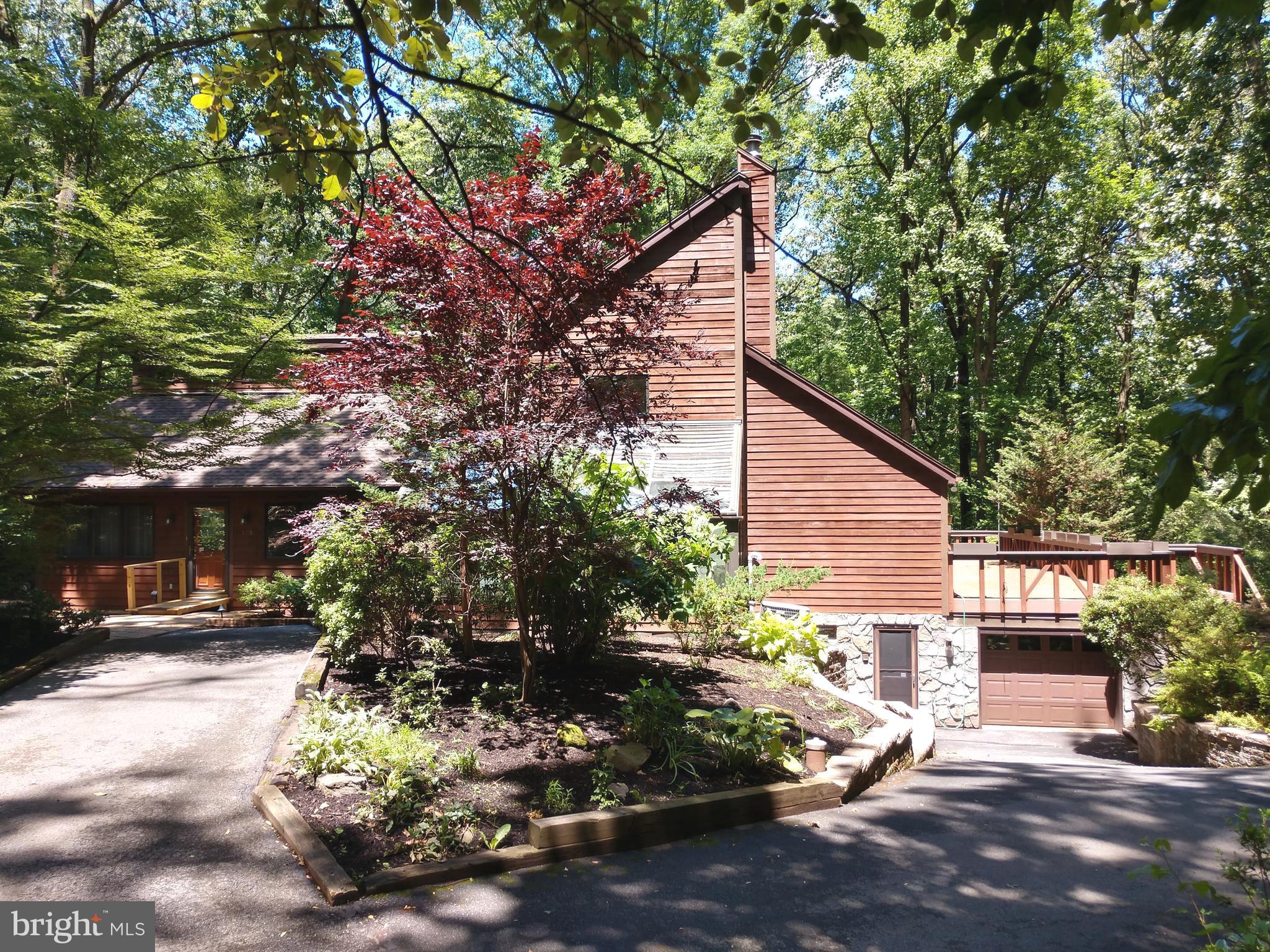 323 Mt Penn Road Reading, PA 19607 - Photo 4 of 75 East of home, drive through garage & In Law entry.