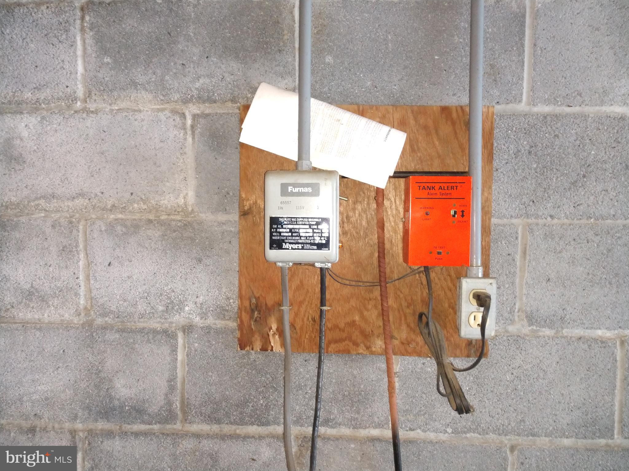 323 Mt Penn Road Reading, PA 19607 - Photo 55 of 75 Septic Pump Alarm in Attached garage. New pump.