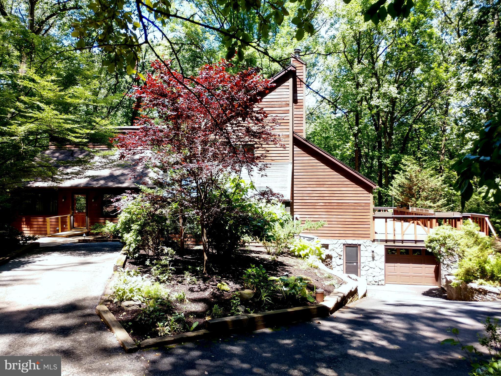 323 Mt Penn Road Reading, PA 19607 - Photo 70 of 75 East of home, drive through garage & In Law entry.