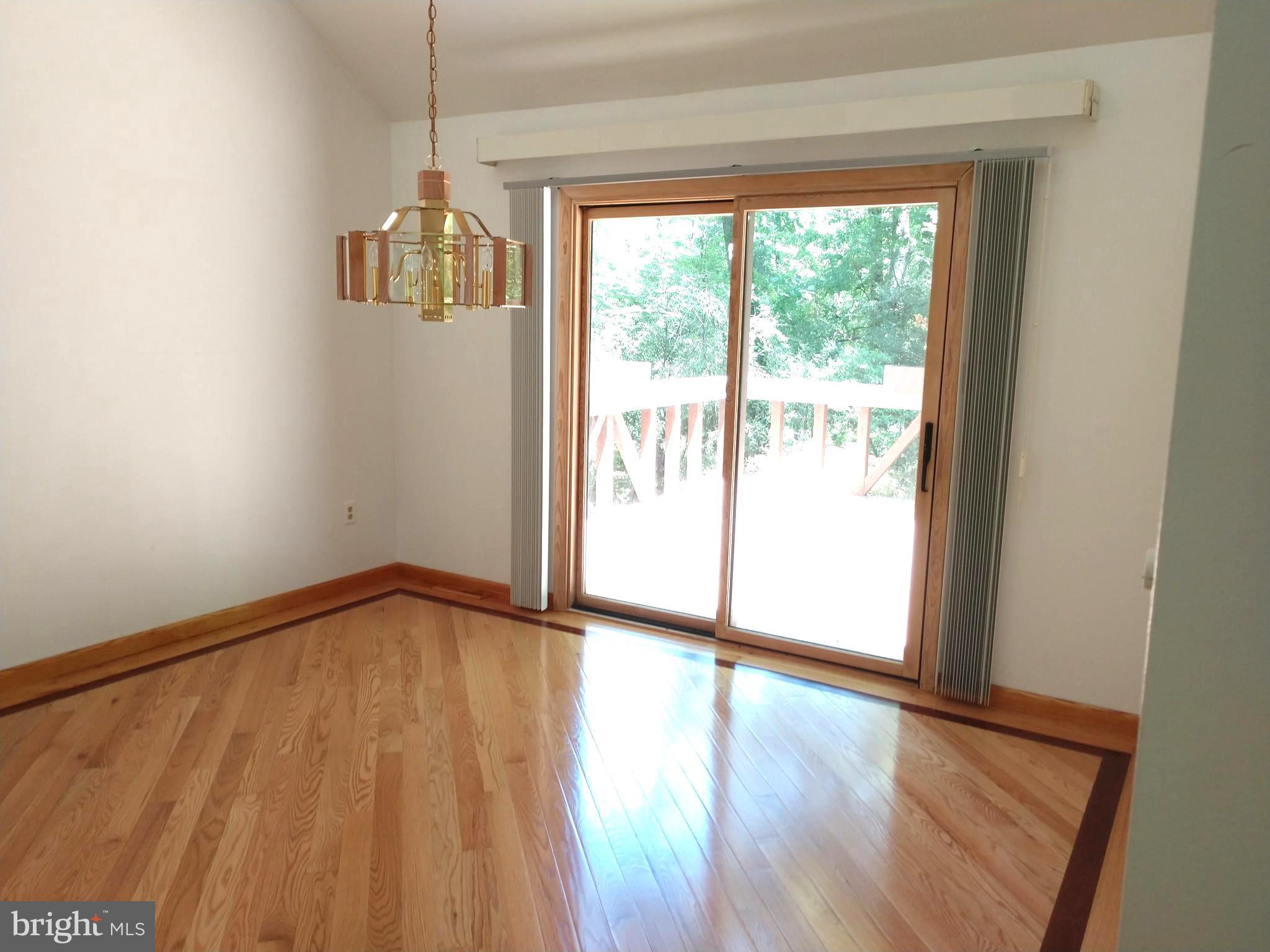 323 Mt Penn Road Reading, PA 19607 - Photo 8 of 75 Dining room to Deck - Cathedral ceiling
