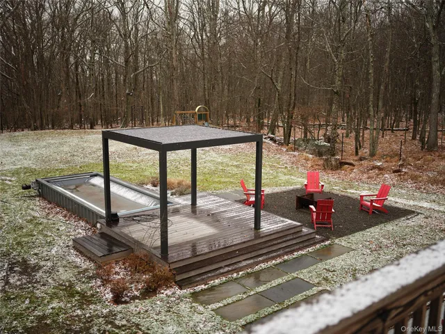 a view of a park with sitting area