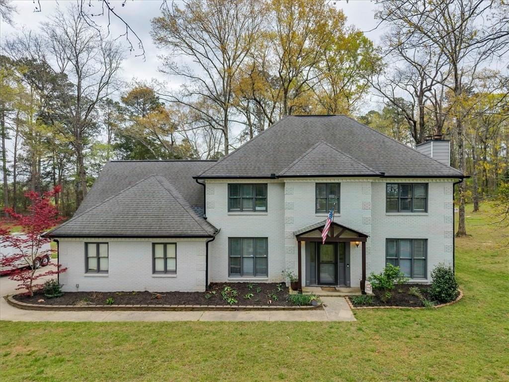 3410 Pilot Road Covington, GA 30014 - Photo 46 of 66 a front view of a house with a yard