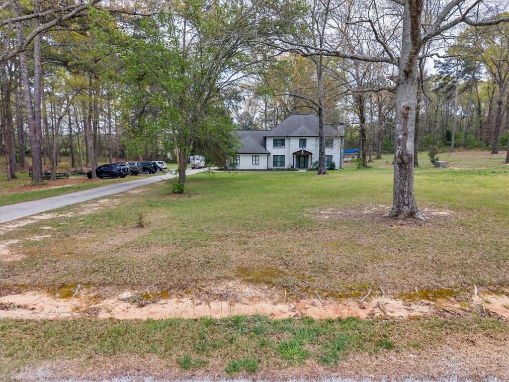3410 Pilot Road Covington, GA 30014 - Photo 48 of 66 a view of a house with a yard