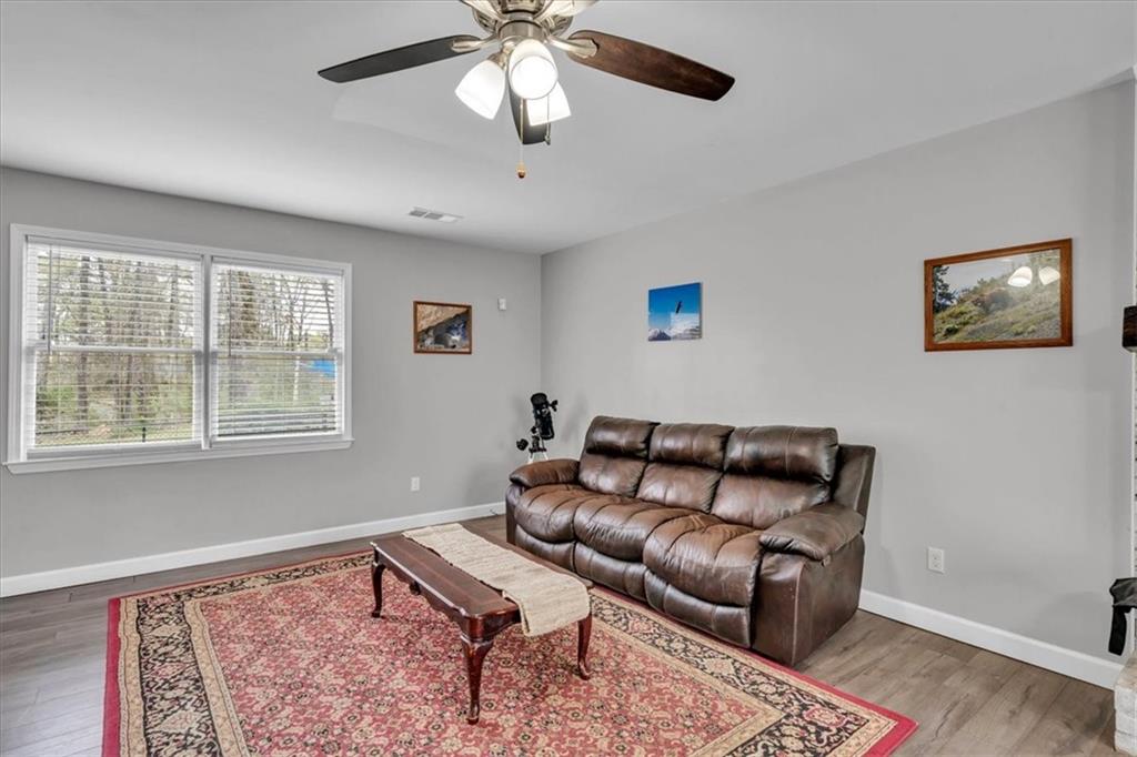 3410 Pilot Road Covington, GA 30014 - Photo 7 of 66 a living room with furniture and a window