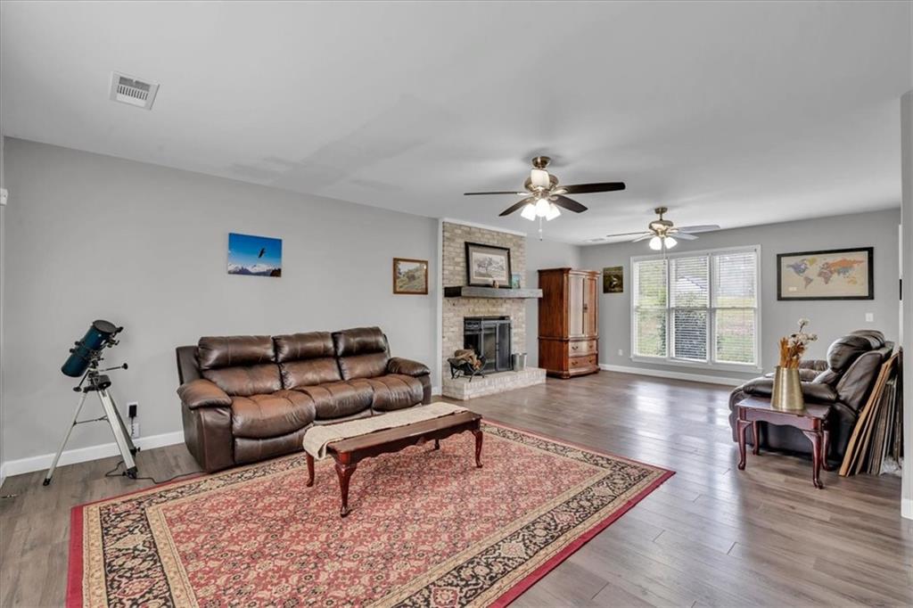 3410 Pilot Road Covington, GA 30014 - Photo 8 of 66 a living room with furniture and wooden floor