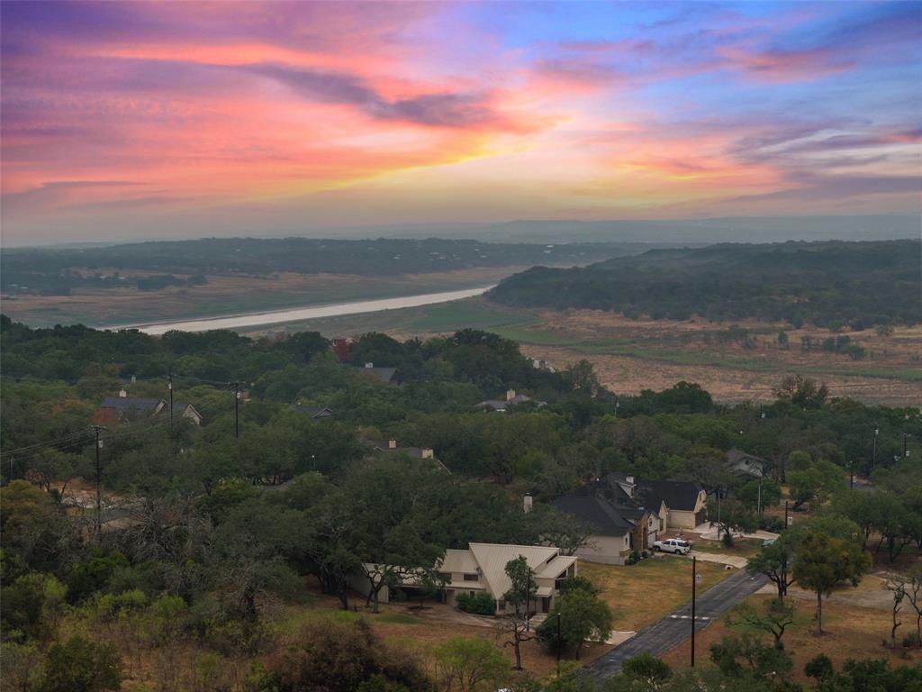 318 Coventry Road Spicewood, TX 78669 - Photo 2 of 38 Aerial view at dusk