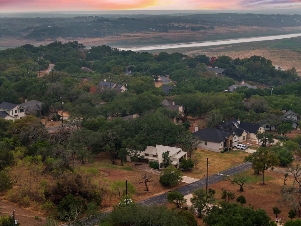 318 Coventry Road Spicewood, TX 78669 - Photo 38 of 38 Aerial view of property and surrounding area featuring nearby suburban area