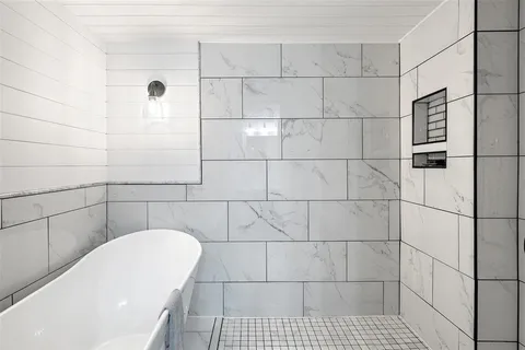 a bathroom with a bathtub