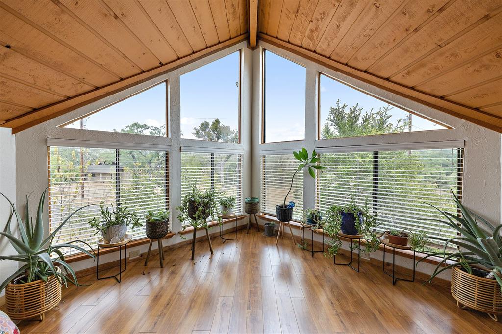 318 Coventry Road Spicewood, TX 78669 - Photo 9 of 38 Sunroom featuring wooden ceiling and wood-type flooring