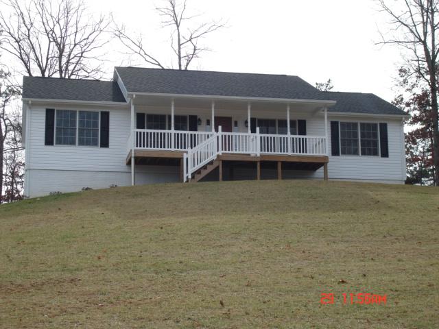 3310 Blue Ridge Boulevard Blue Ridge, VA 24064 - Photo 1 of 1 a front view of a house with a garden