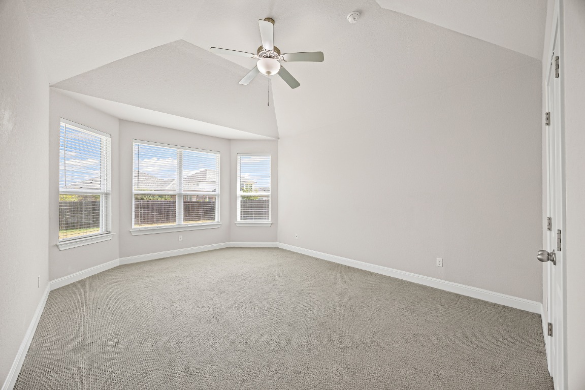 187 Glass Mountain Way Dripping Springs, TX 78620 - Photo 14 of 35 an empty room with a window