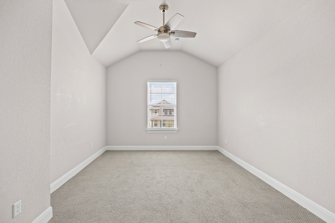 187 Glass Mountain Way Dripping Springs, TX 78620 - Photo 29 of 35 an empty room with a window