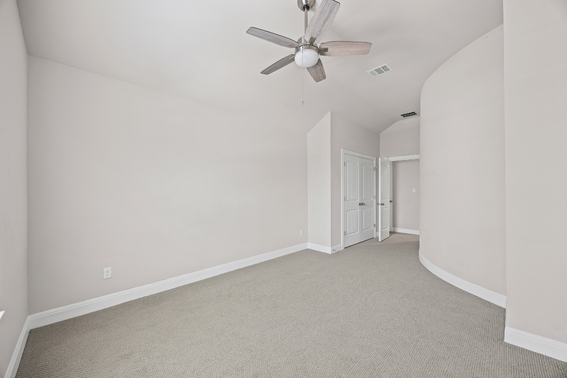 187 Glass Mountain Way Dripping Springs, TX 78620 - Photo 30 of 35 a view of an empty room