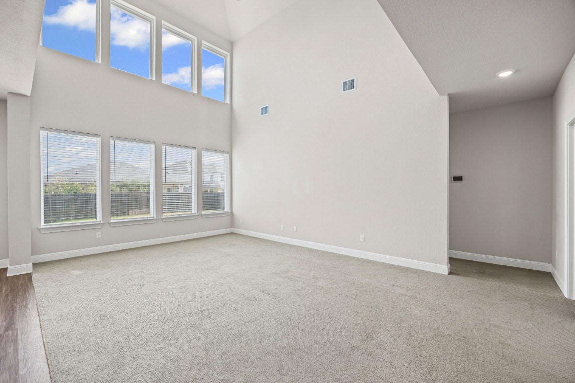 187 Glass Mountain Way Dripping Springs, TX 78620 - Photo 5 of 35 an empty room with windows