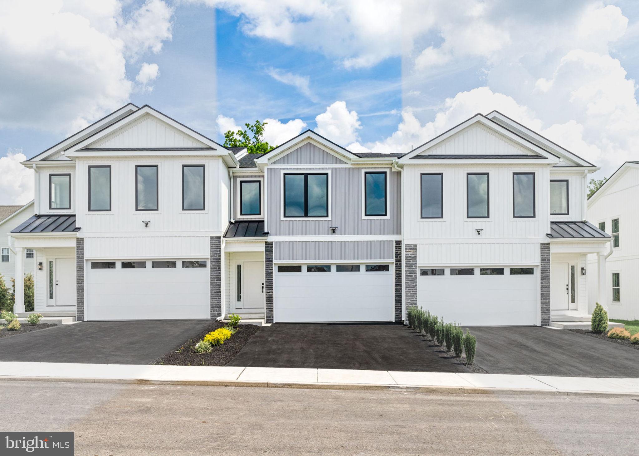 681 Provident Road Southampton, PA 18966 - Photo 2 of 33 a front view of a house with a yard and garage